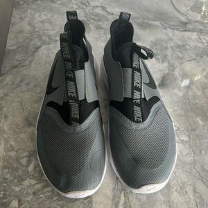 Kid’s Nike slip-on gym shoes. Children’s size 6